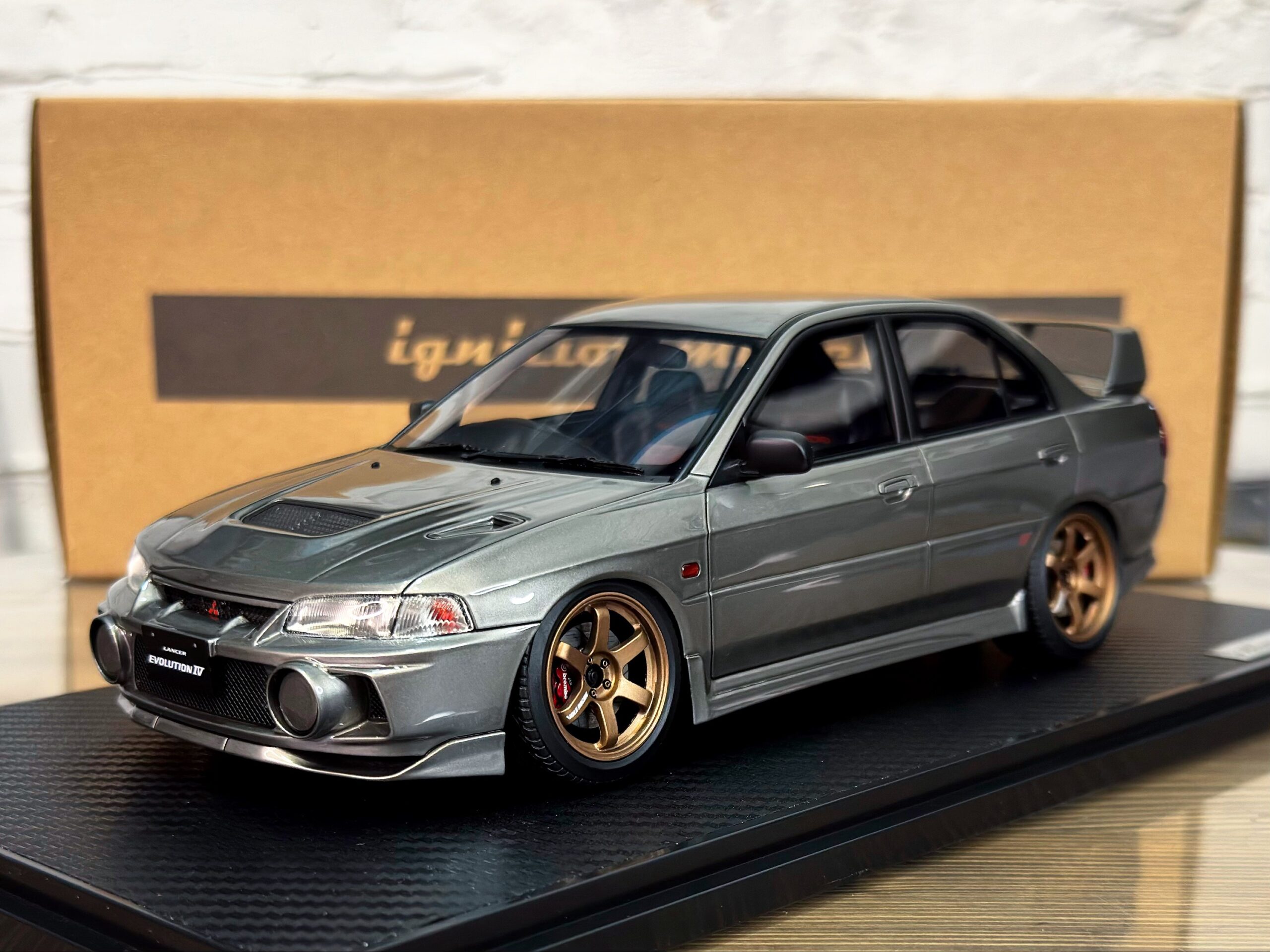 IG3851 Ignition Model Mitsubishi Lancer Evolution IV (CN9A) Gun Metallic 1:18