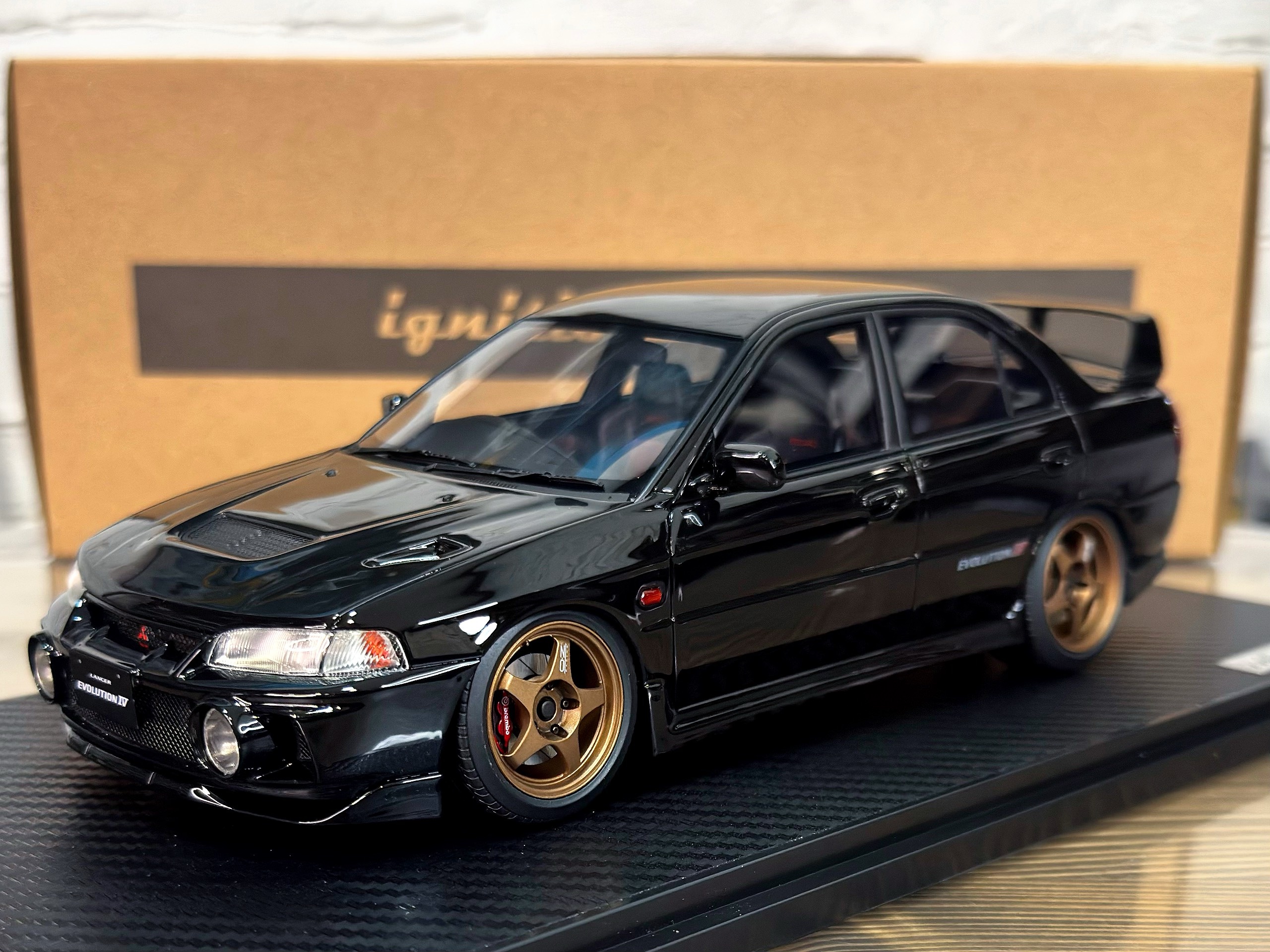 IG3785 Ignition Model Mitsubishi Lancer Evolution IV (CN9A) Black 1:18